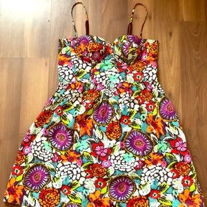 A cup fitted bodice w/ adjustable straps sundress